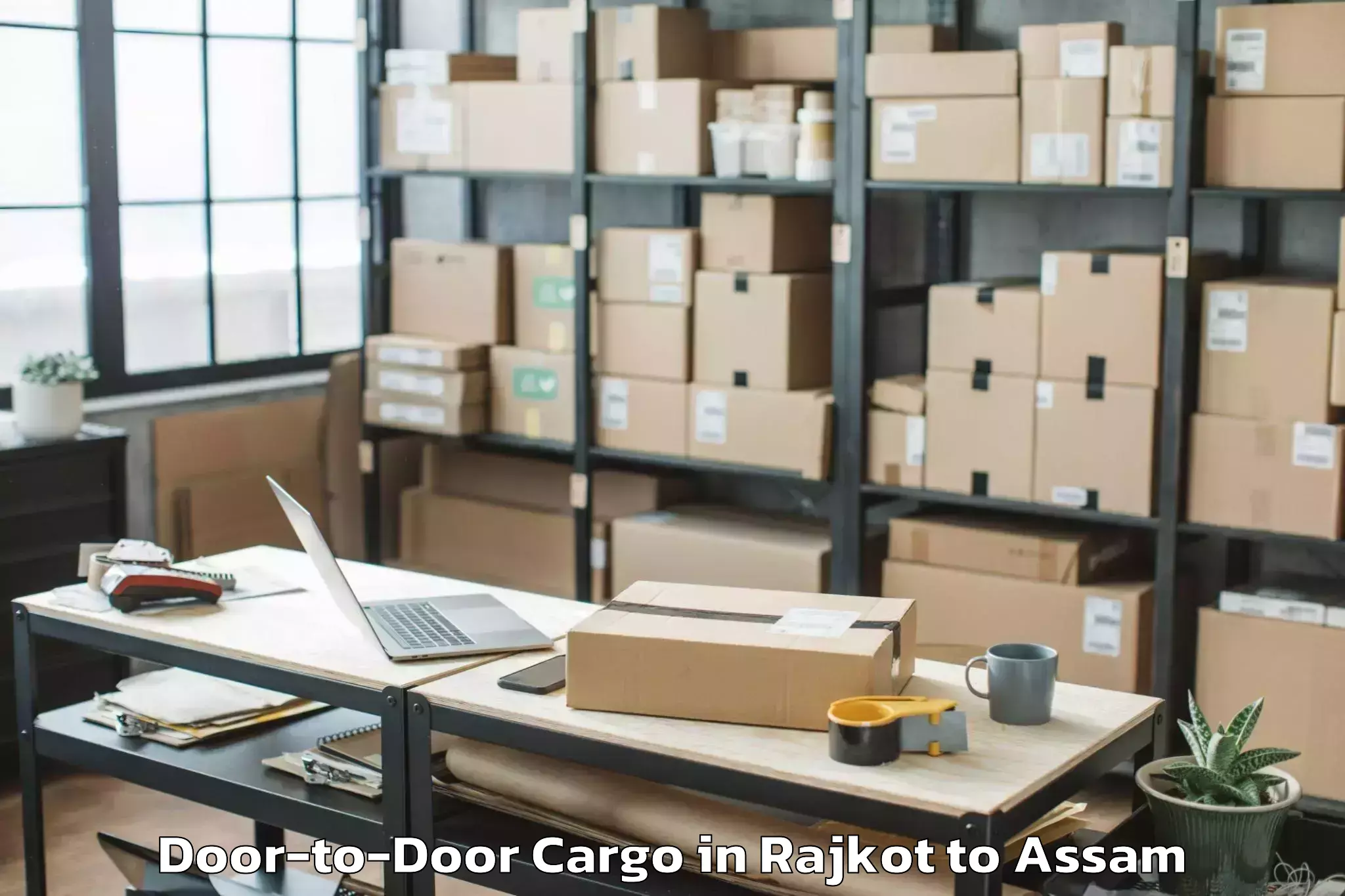 Easy Rajkot to Rangapara Door To Door Cargo Booking